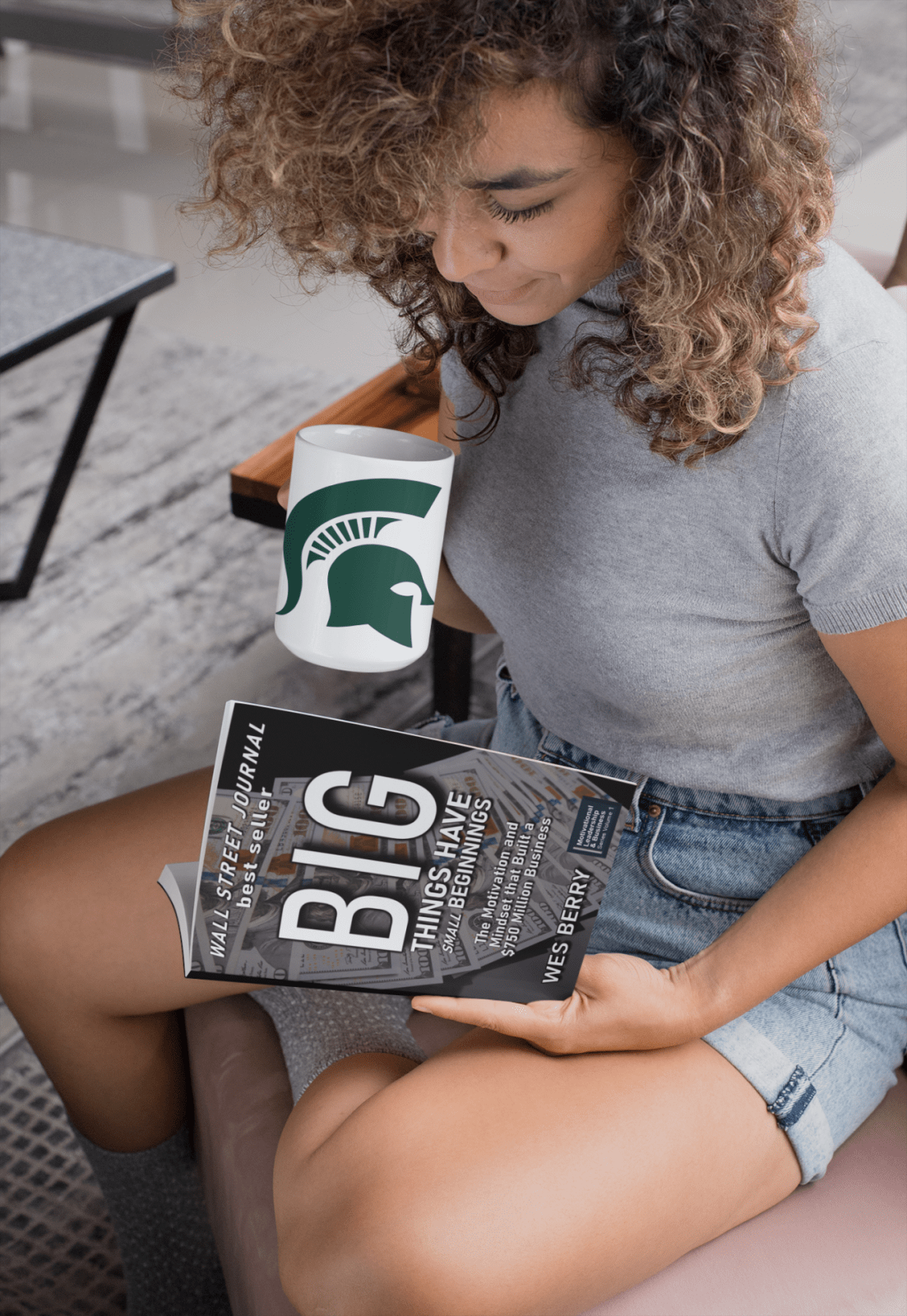 big-girl-mockup-of-a-woman-reading-a-book-and-holding-a-coffee-mug-28467-4
